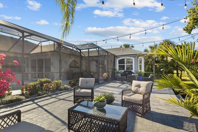 view of patio / terrace with a lanai