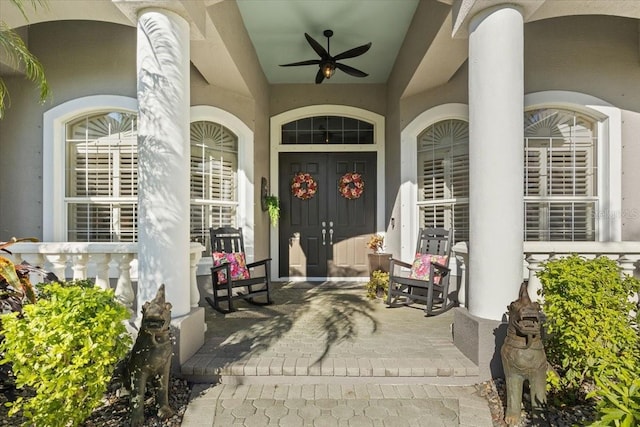 property entrance featuring ceiling fan