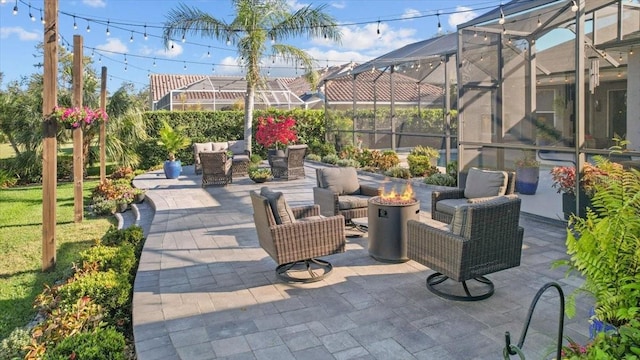 view of patio / terrace with a lanai