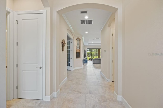 hallway with crown molding