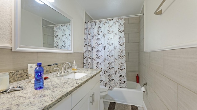 full bathroom with vanity, toilet, and shower / bath combo