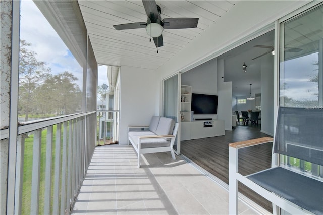 balcony featuring ceiling fan