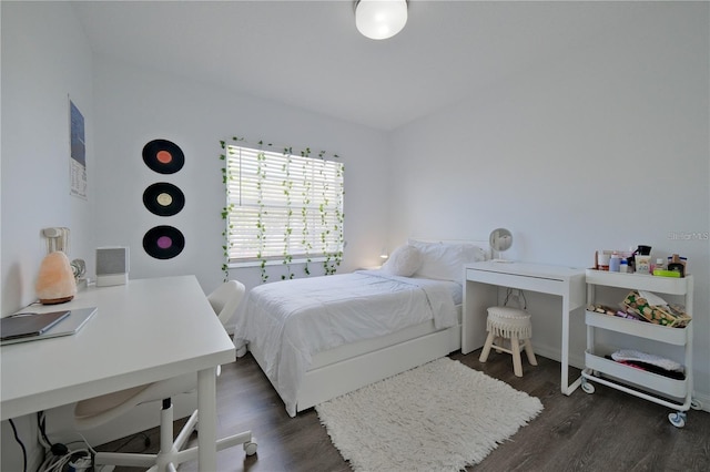 bedroom featuring dark hardwood / wood-style floors