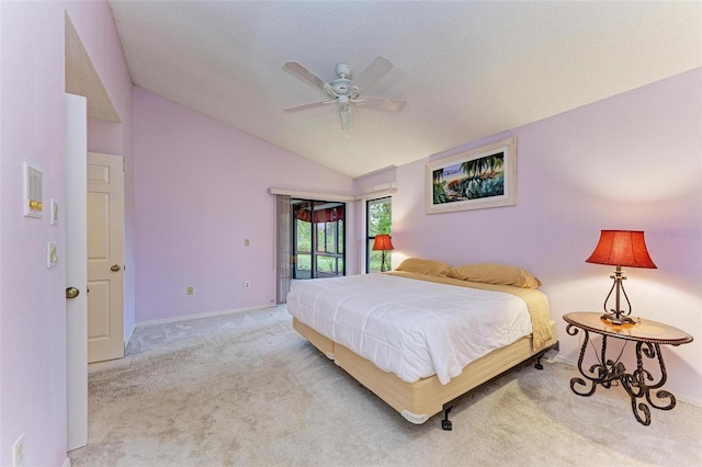 bedroom with access to exterior, light carpet, ceiling fan, and lofted ceiling