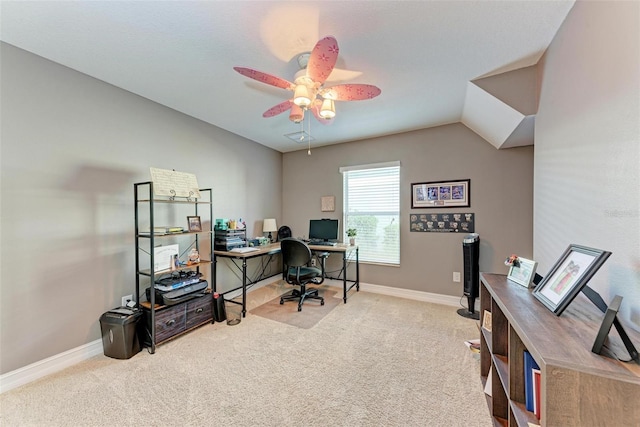 carpeted office featuring ceiling fan and vaulted ceiling