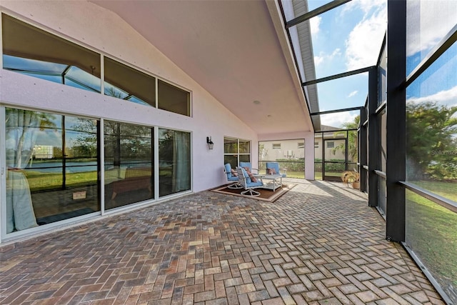 unfurnished sunroom with lofted ceiling