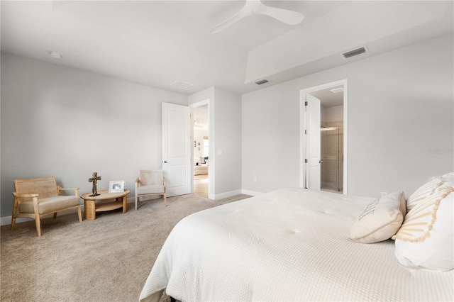 carpeted bedroom featuring connected bathroom and ceiling fan