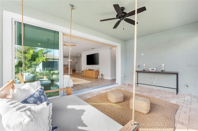 living room featuring ceiling fan