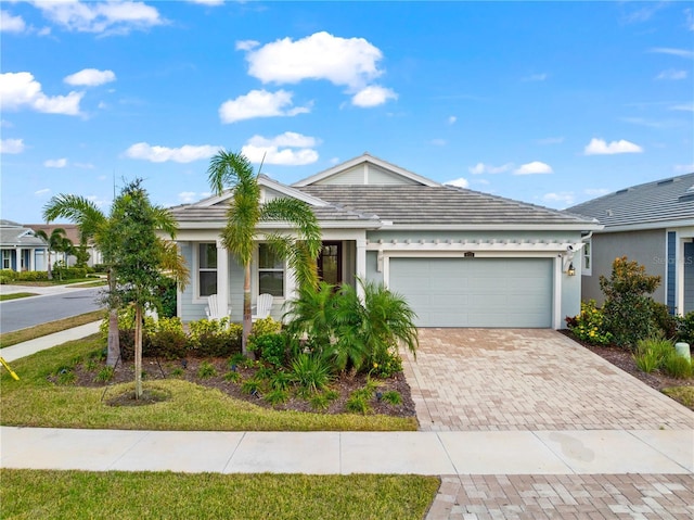 single story home featuring a garage