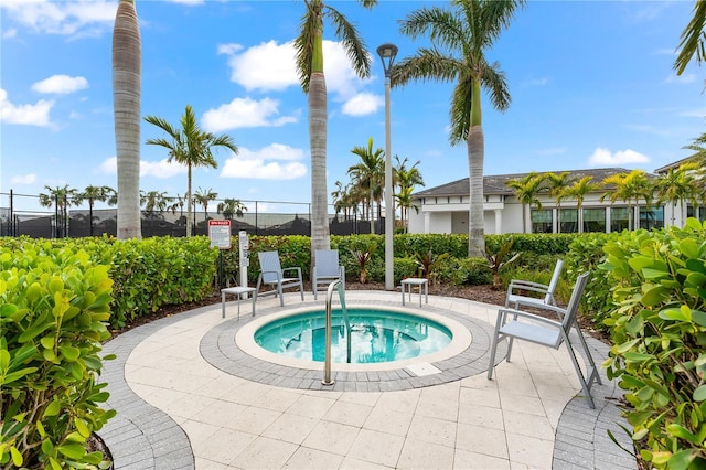 view of pool featuring a community hot tub