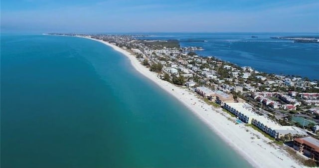 aerial view featuring a water view and a beach view