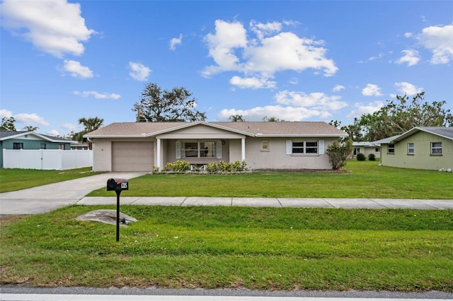 single story home with a front yard and a garage