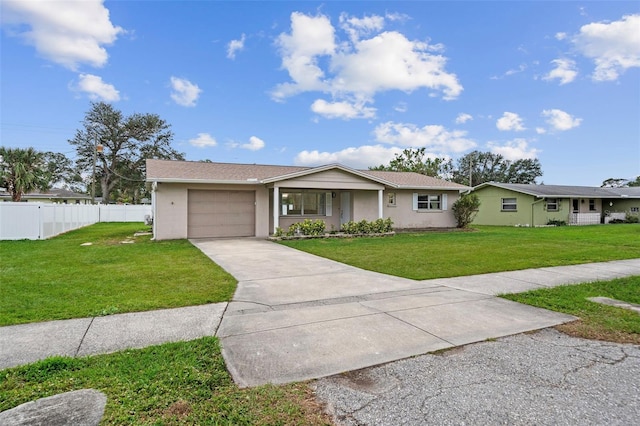 single story home featuring a front lawn and a garage