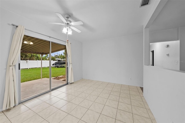 unfurnished room featuring ceiling fan and light tile patterned floors