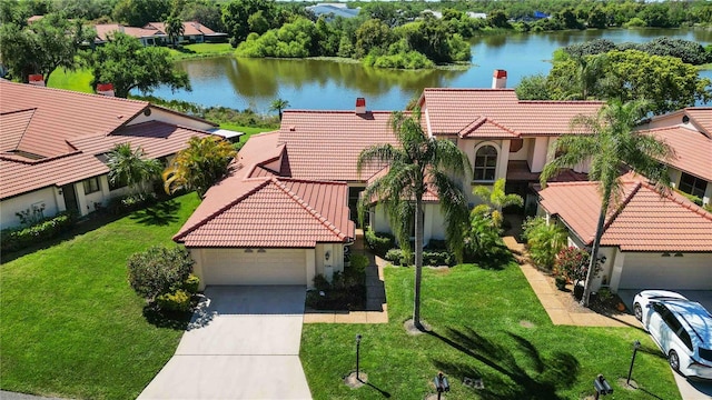 bird's eye view with a water view