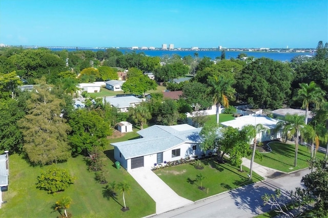 drone / aerial view with a water view