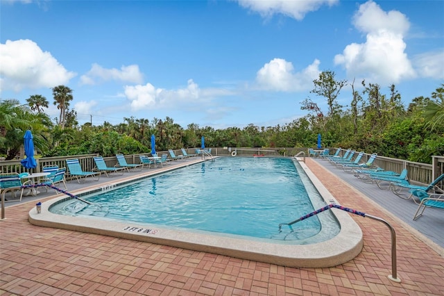 view of swimming pool featuring a patio