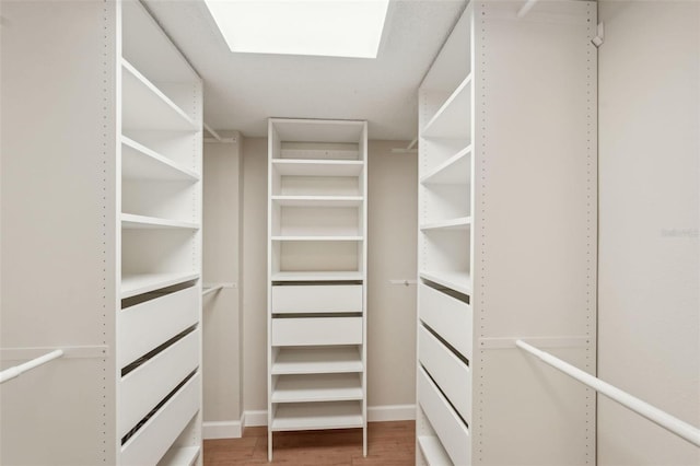 2753 Orchid Oaks Dr Unit 104, Sarasota, FL 34239 - spacious closet with wood finished floors