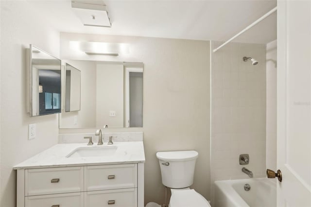2753 Orchid Oaks Dr Unit 104, Sarasota, FL 34239 - bathroom featuring toilet, vanity, and shower / bathtub combination