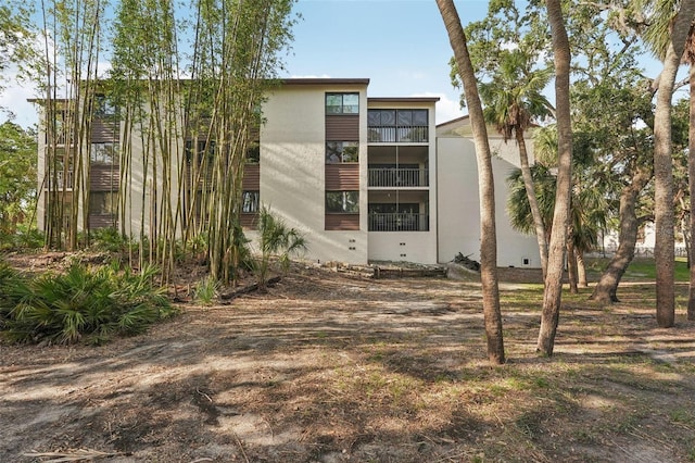 2753 Orchid Oaks Dr Unit 104, Sarasota, FL 34239 - view of rear view of house