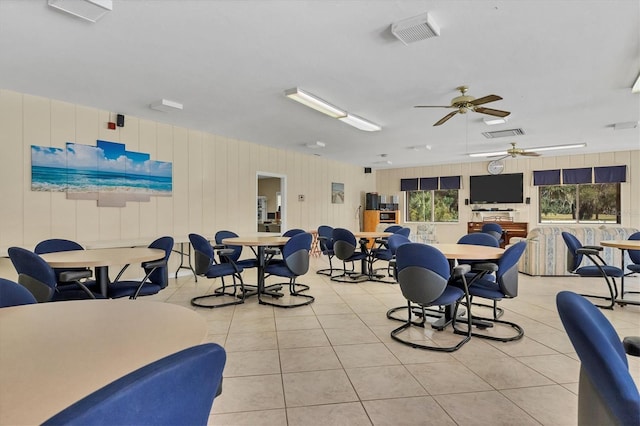 interior space featuring ceiling fan