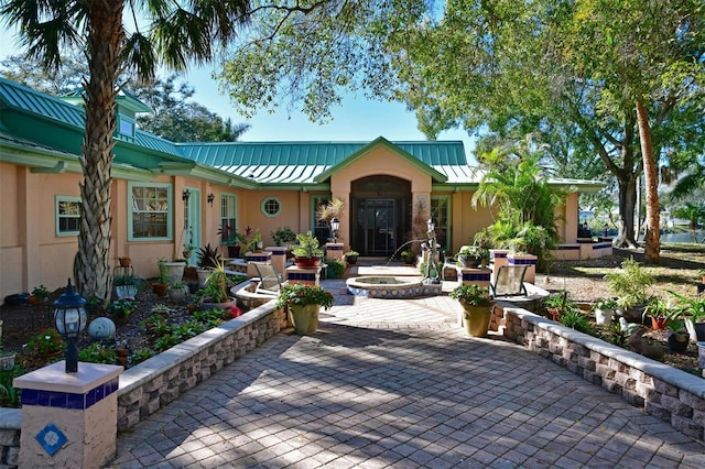 view of front facade featuring a patio area