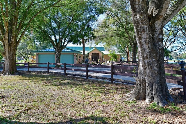 view of yard featuring a garage