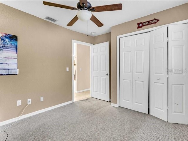 1382 Ronald St, North Port, FL 34286 - unfurnished bedroom with carpet, a closet, and ceiling fan