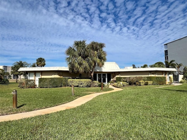 view of front of home with a front yard