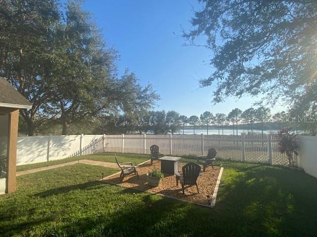 view of yard with a water view