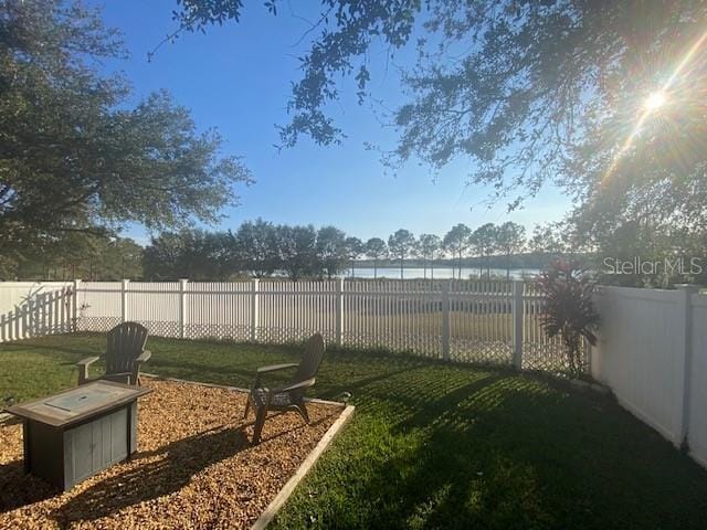 view of yard with a water view