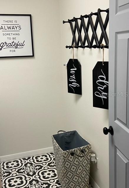 mudroom featuring tile patterned flooring