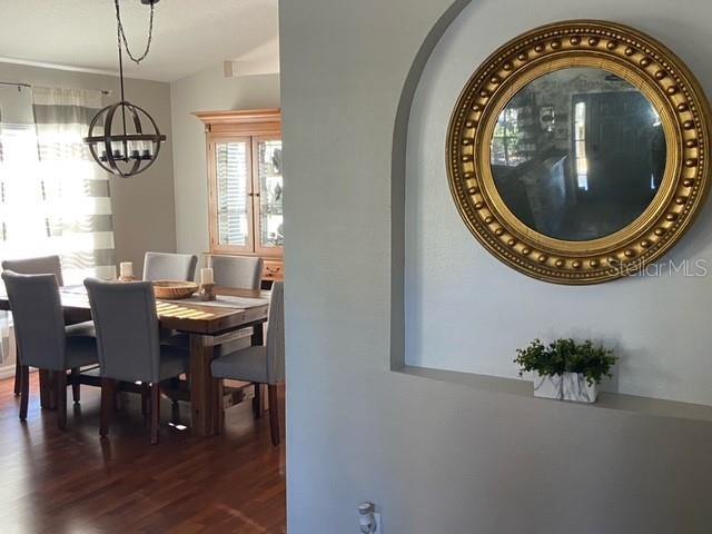 dining room featuring dark wood-type flooring