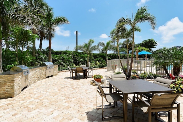 view of patio / terrace with exterior kitchen and area for grilling