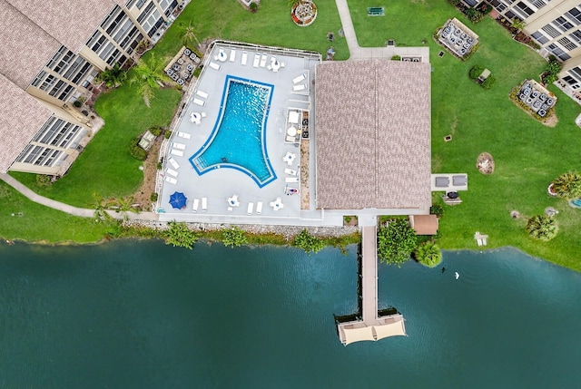 birds eye view of property featuring a water view