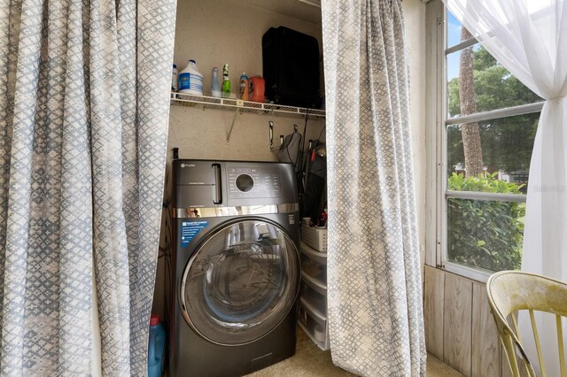 washroom featuring washer / clothes dryer