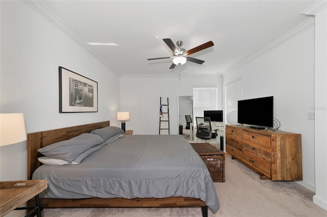 carpeted bedroom with ceiling fan and ornamental molding