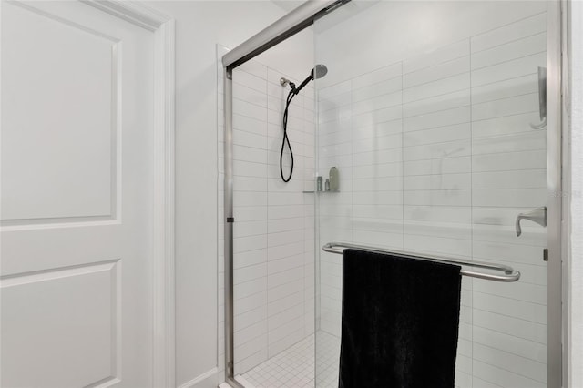 bathroom featuring an enclosed shower