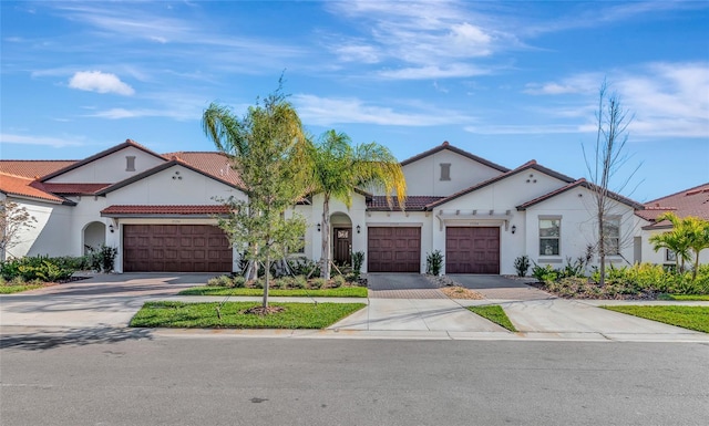 mediterranean / spanish-style house featuring a garage