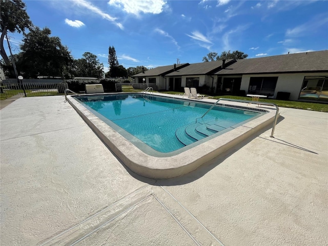 view of pool featuring a patio area