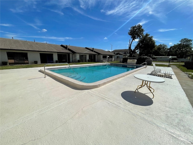 view of pool with a patio area