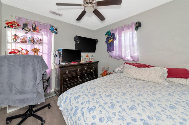 bedroom featuring ceiling fan and light wood-type flooring