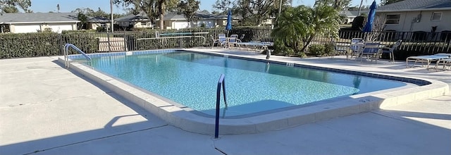 view of pool featuring a patio