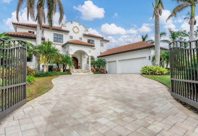 mediterranean / spanish-style house featuring a garage