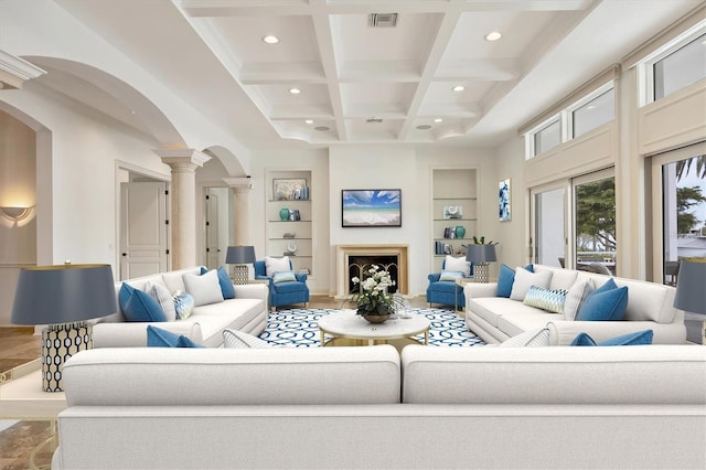 living room featuring ornate columns, coffered ceiling, built in features, and beam ceiling