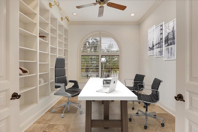 office space featuring built in shelves, ceiling fan, and ornamental molding