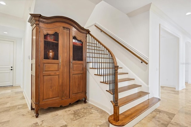 staircase with crown molding