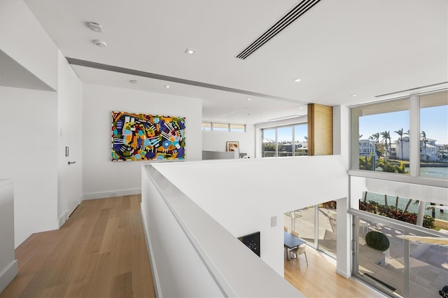 hall featuring light hardwood / wood-style flooring