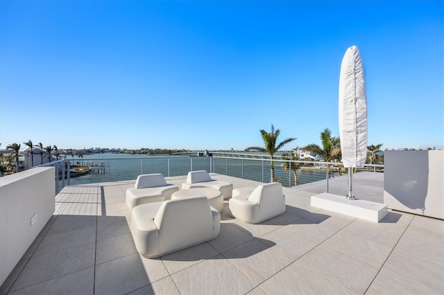 view of patio / terrace with a water view