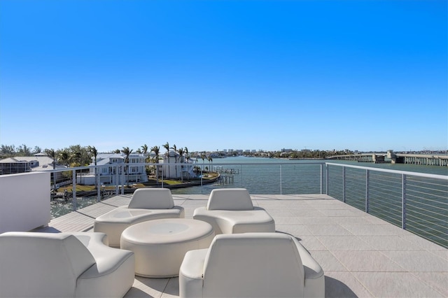 view of patio with a water view